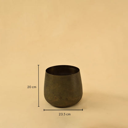 Brown metal planter decor with 20 cm height and 23.5 cm width perfect for shelves tables and modern home styling.
