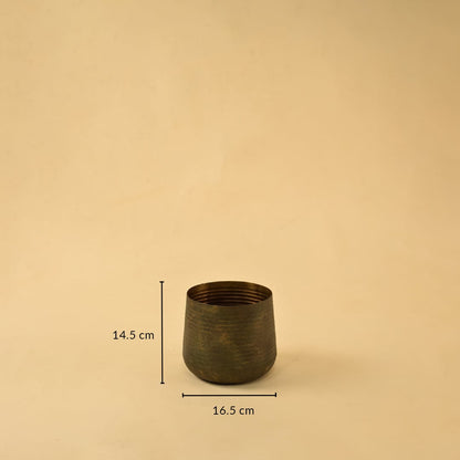 Brown metal planter decor with 14.5 cm height and 16.5 cm width perfect for shelves tables and modern home styling.