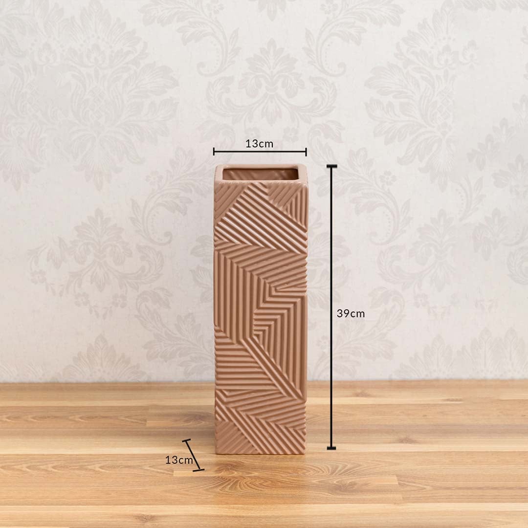 A tall brown geometric vase with measurements showing 39 cm height and 13 cm width clearly presenting its size and design details.