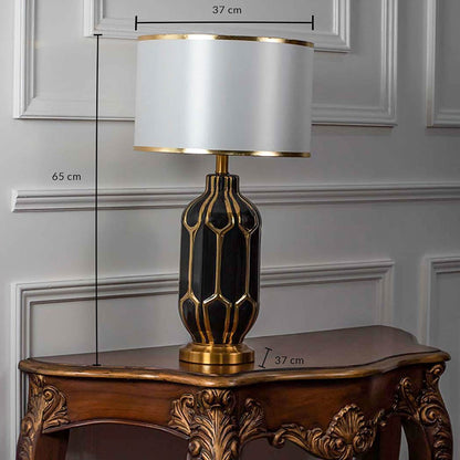 Black gold ceramic lamp dimensions 65 cm height and 37 cm width with gold base.