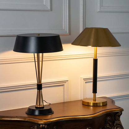 Black and gold table lamps with illuminated wide shades shown together highlighting stylish lighting options for modern desks and workspaces.