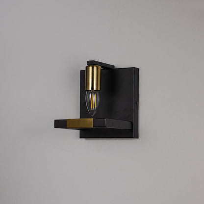 Black and gold wall light with metal frame and exposed bulb shown off on white background for modern interior wall decor.