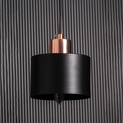 Detailed closeup of gold and amber glass wall light highlighting the glossy globe texture and elegant metal frame for contemporary interior styling.
