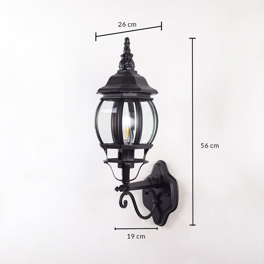 Black outdoor wall lantern 56cm height 19cm width upward facing dimension image showing vintage coach style exterior fixture.