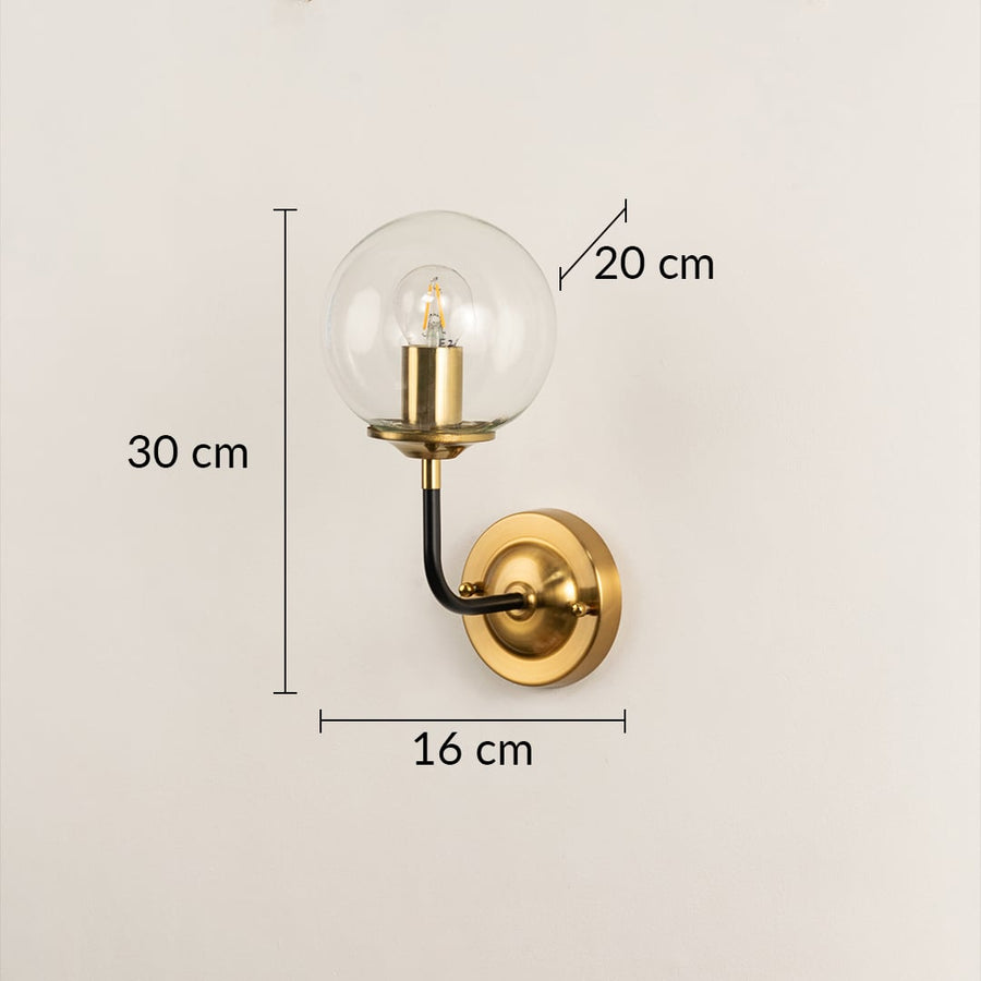 Modern gold and black wall lamp with clear globe ideal for chic décor shown with height 30 cm width 16 cm and depth 20 cm enhancing contemporary interiors.