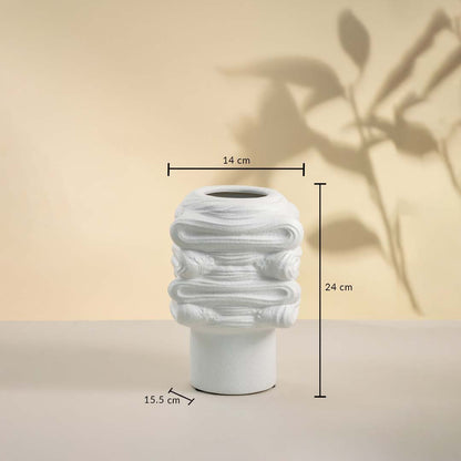 White handcrafted ceramic vase with sculptural pattern displayed on white background showing height 24 cm and width 14 cm for tabletop styling.