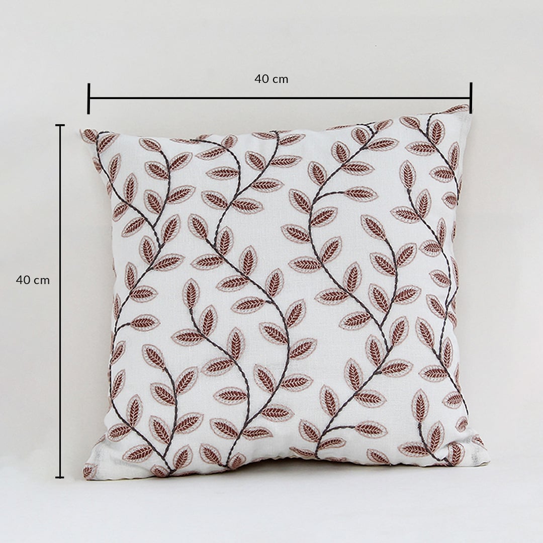 Cotton cushion with brown leaf embroidered pattern measured at 40 cm by 40 cm displayed on a white background showing its square decorative design.