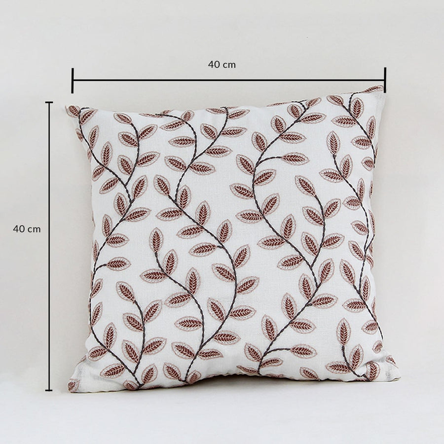 Cotton cushion with brown leaf embroidered pattern measured at 40 cm by 40 cm displayed on a white background showing its square decorative design.