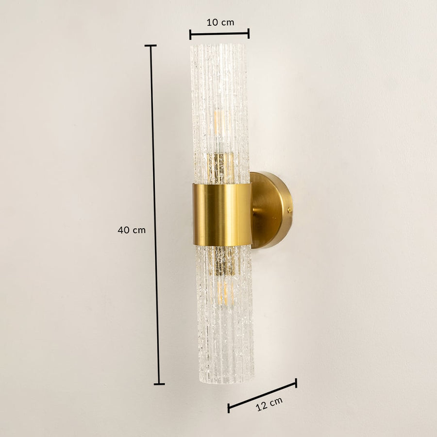 A gold wall light with textured cylindrical glass shades shown with full measurements displaying a height of 40 cm a width of 10 cm and a depth of 12 cm for precise installation.