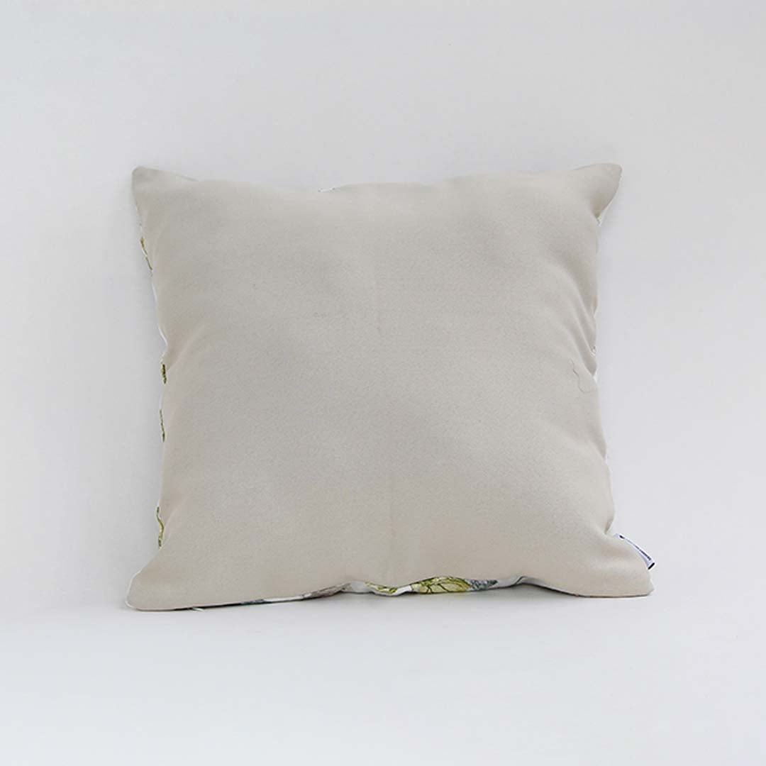 Beige cotton cushion cover shown from the side in a plain design ideal for simple natural décor styling with a soft breathable and skin friendly fabric texture.