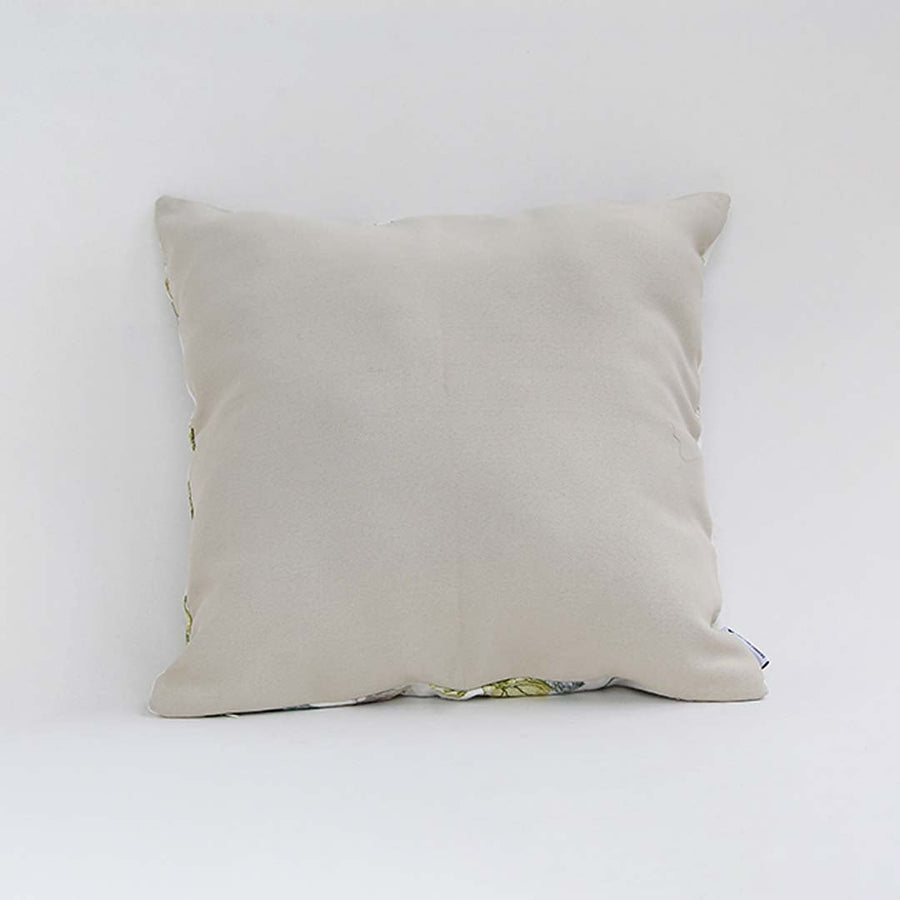Beige cotton cushion cover shown from the side in a plain design ideal for simple natural décor styling with a soft breathable and skin friendly fabric texture.