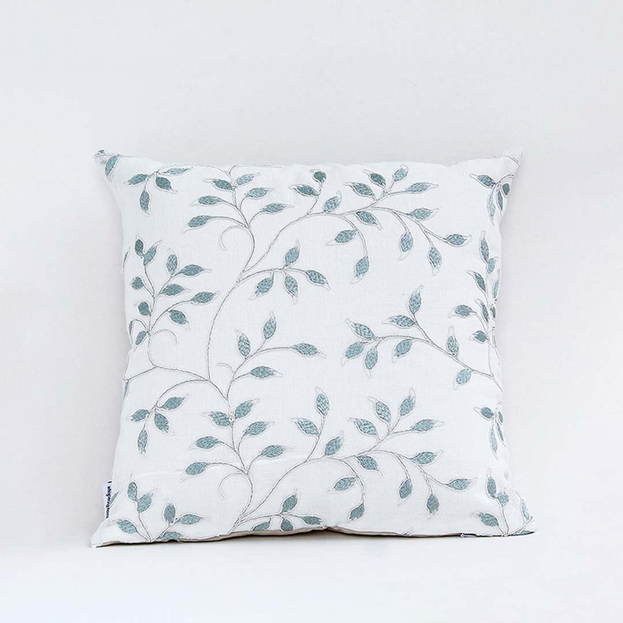 White cotton cushion cover with grey botanical embroidery giving a calm natural décor feel with a breathable soft and skin friendly fabric ideal for modern and elegant interiors.