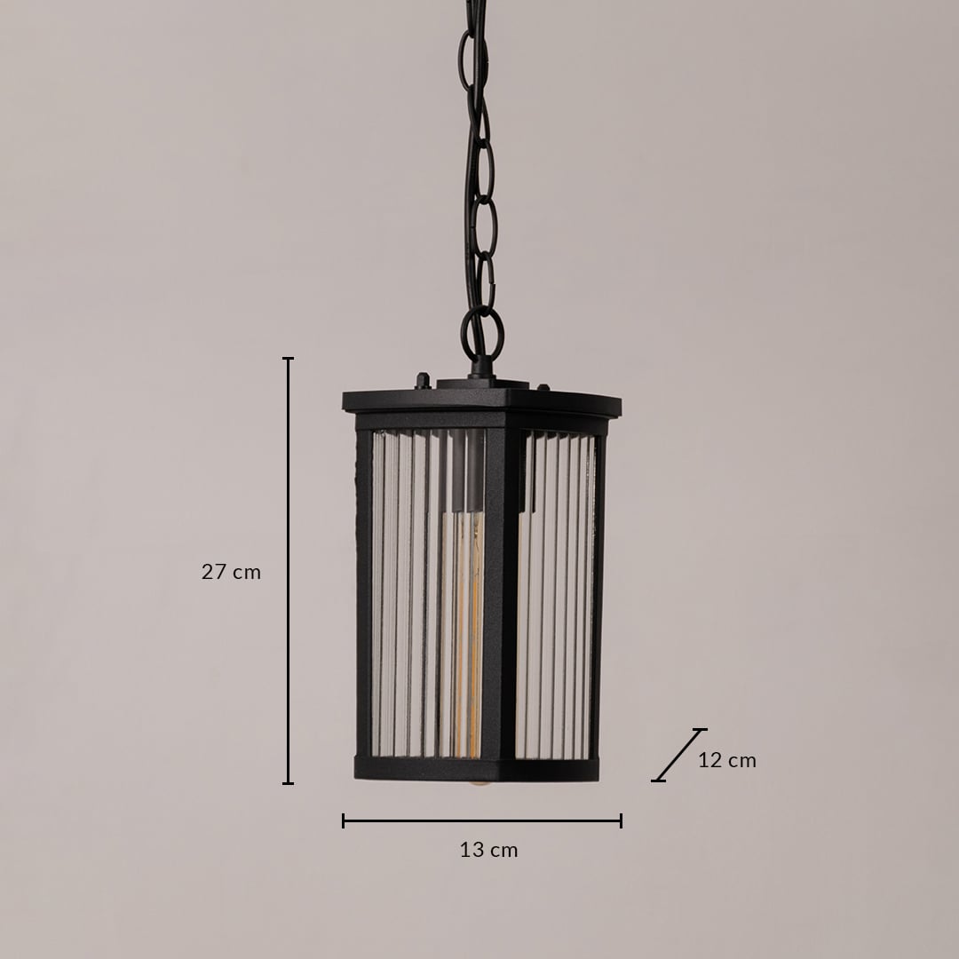 Black metal hanging lantern with ribbed glass sized 27 cm height 13 cm width and 12 cm depth for outdoor lighting.