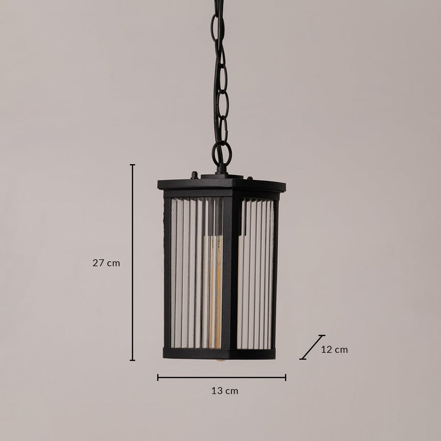 Black metal hanging lantern with ribbed glass sized 27 cm height 13 cm width and 12 cm depth for outdoor lighting.