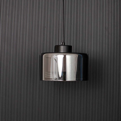 Smoked glass pendant light with black top modern ceiling lamp for luxury dining table and bedroom interiors black background view.