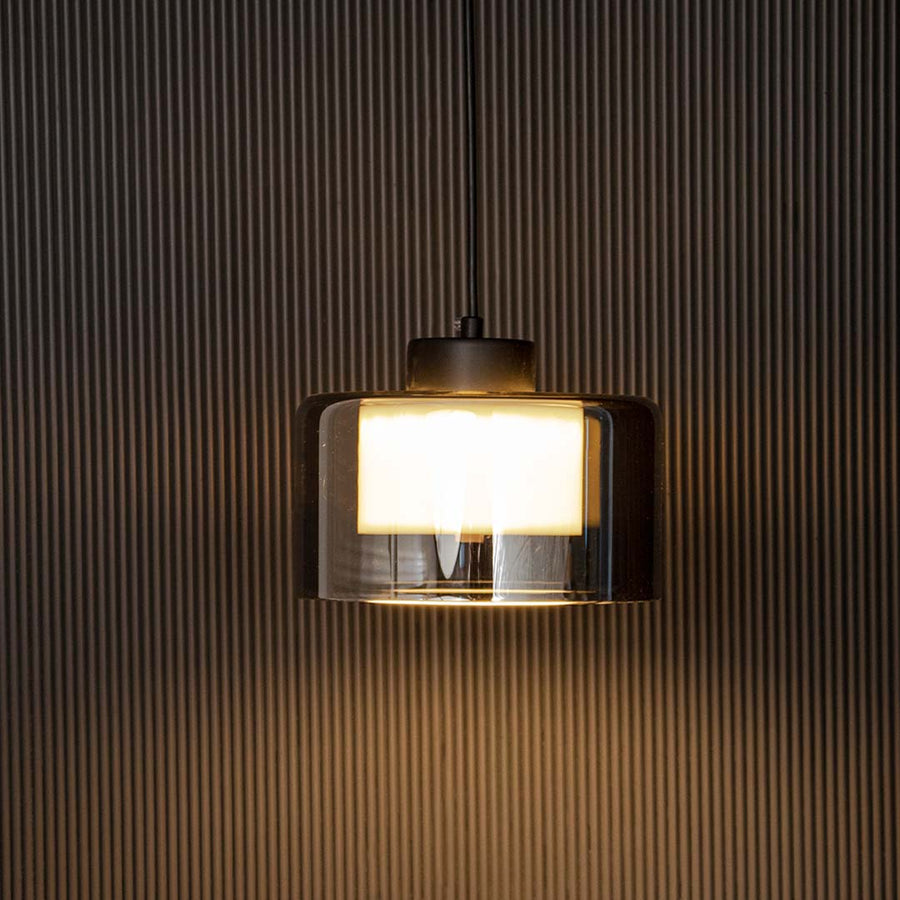 Modern smoked glass pendant lamp glowing warm light with black finish stylish ceiling lamp for home interior decoration lighting.