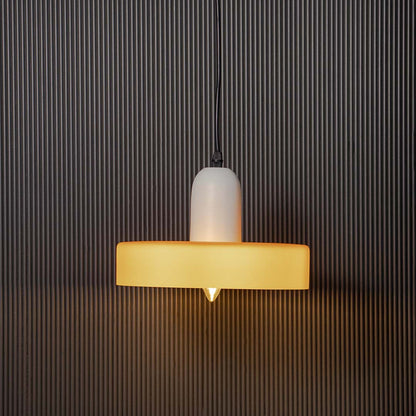 White and mustard yellow pendant ceiling light glowing warmly against dark black background creating luxury home decor look.