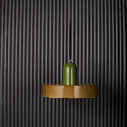 Green and brown two tone pendant ceiling light with round shape displayed stylishly against black background for modern decor.