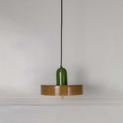 White feather pendant light with green and gold accents crafted for elegant modern living spaces.