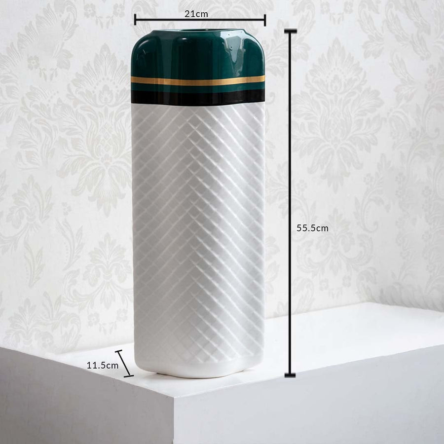 Dimension image of a white ceramic cylinder vase with diagonal chevron textures and an emerald green and gold top collar 31.5 cm height and 13 cm width.