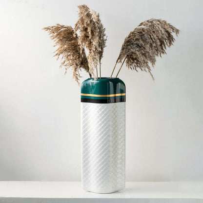 Tall green and white patterned vase with pampas grass for elegant modern home decor and luxury interior accents.