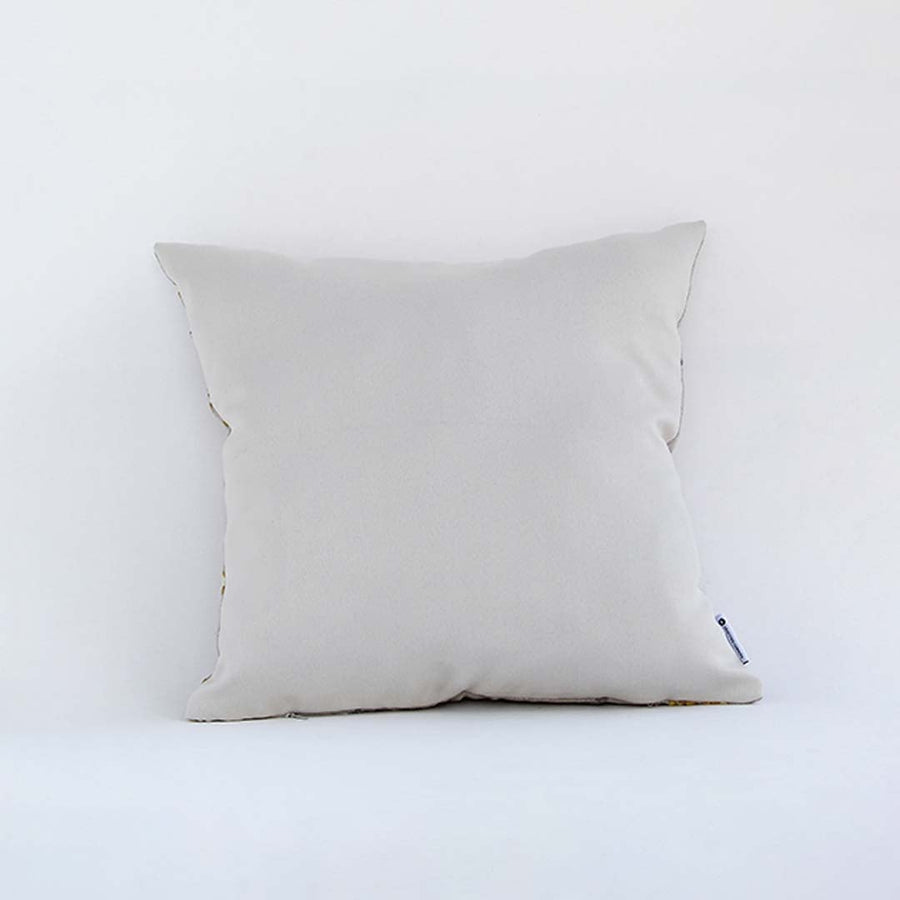 Back side view of white floral cushion cover showing clean stitching smooth fabric finish and concealed closure.