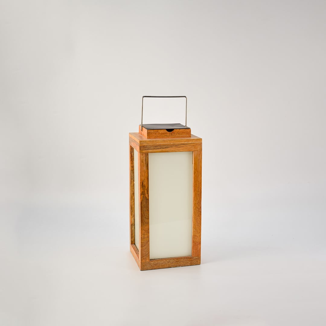 Wood lantern on black background displaying premium wooden frame and smooth frosted glass panels in a dark minimalist backdrop.