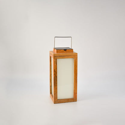 Wood lantern on black background displaying premium wooden frame and smooth frosted glass panels in a dark minimalist backdrop.