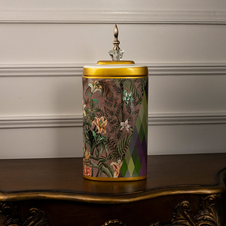 Botanical Bloom tall ceramic jar against a white background highlighting its hand-painted botanical design and metallic top.