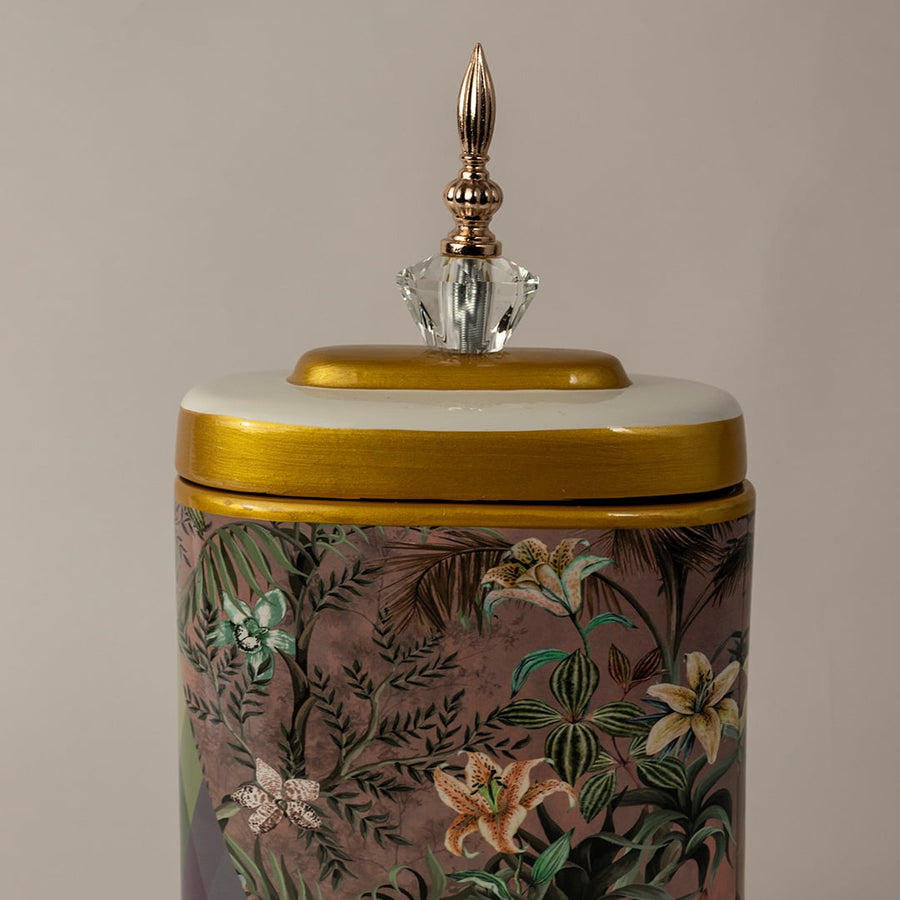 Closeup of Botanical Bloom tall ceramic jar showing vibrant floral hand painting and diamond shaped color patterns.
