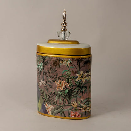 Side view of Botanical Bloom tall ceramic jar showing smooth cylindrical body with botanical design and crystal topped lid.
