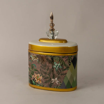 Side angle of floral decorative jar showing curved shape with hand-painted flowers and crystal finial.