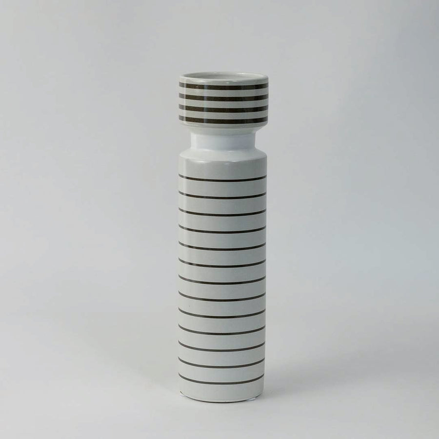 Contemporary tall ceramic vase with striped black pattern designed for living room and office table decor on white background.