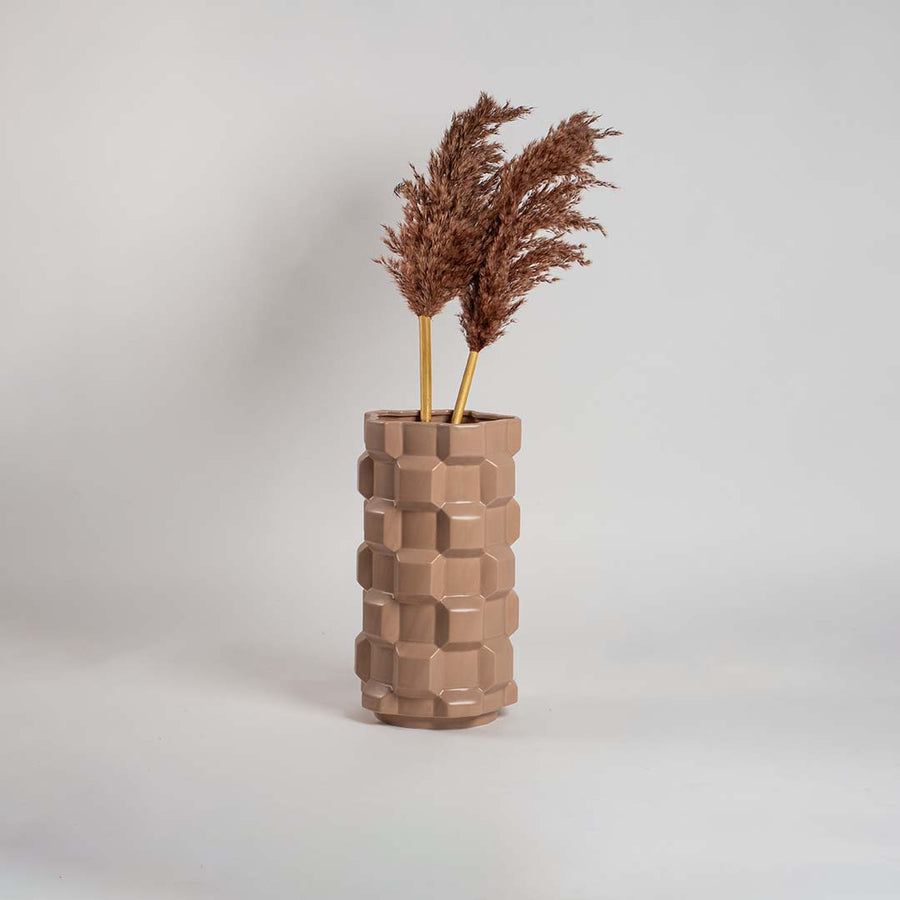 Modern brown geometric ceramic vase shown on a plain white background perfect for stylish minimal interior and accent decor.