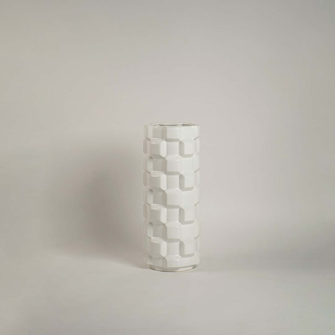 Glossy ceramic vase with cube textured geometric design displayed on plain white background for product view.