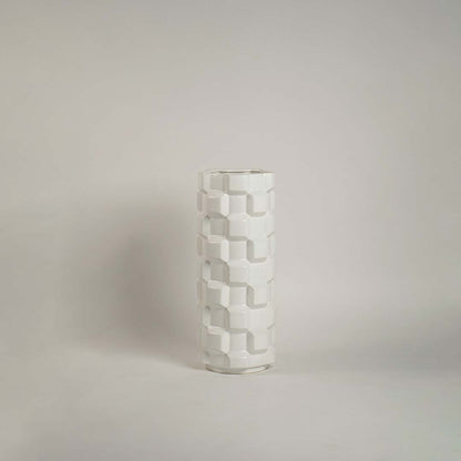 Glossy ceramic vase with cube textured geometric design displayed on plain white background for product view.