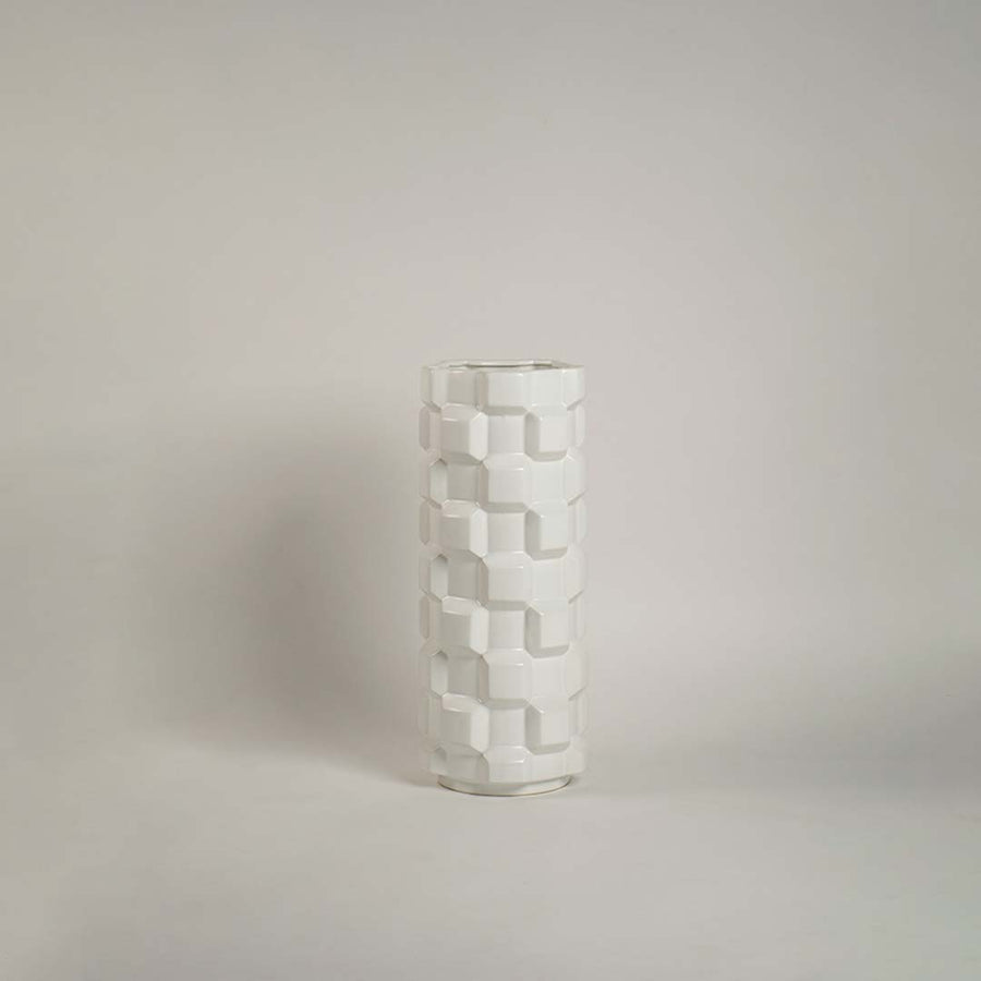 Glossy ceramic vase with cube textured geometric design displayed on plain white background for product view.