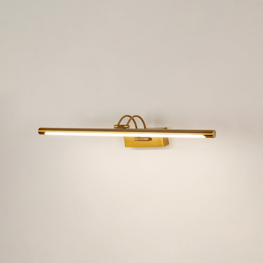 Modern wall light in gold metal finish with linear bar design for bathroom or vanity decor lighting white background.