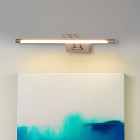 Detailed lifestyle closeup of the silver picture light showcasing its refined metal design for premium wall lighting.