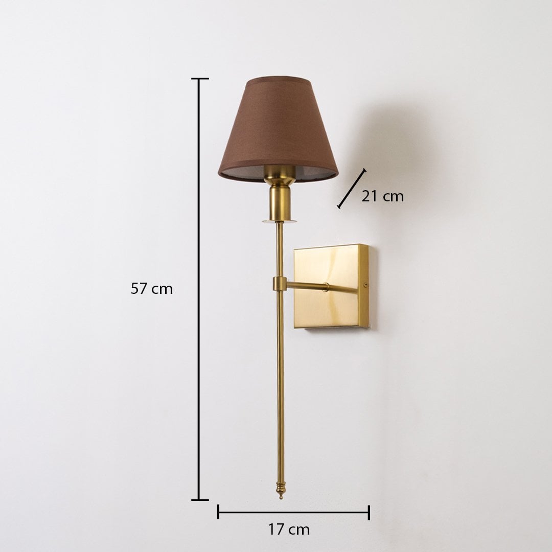 Gold wall sconce with brown shade shown with 57 cm height 17 cm width and 21 cm depth for accurate placement.