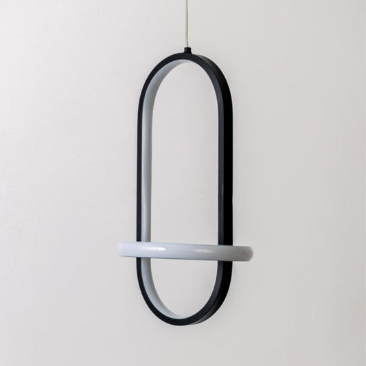 Modern black and white metal oval hanging light shown switched off on white background for minimal home decor styling.