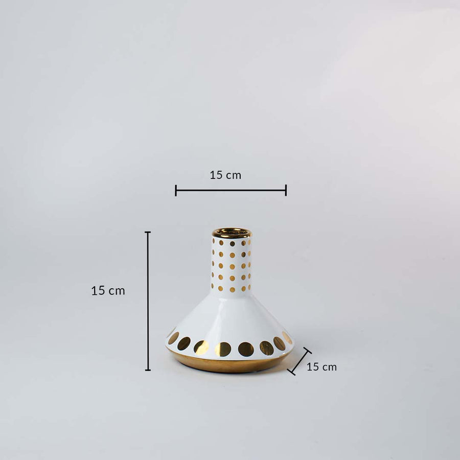 Decorative vase with white and gold polka dots displayed with dimensions 15 cm x 15 cm x 15 cm.