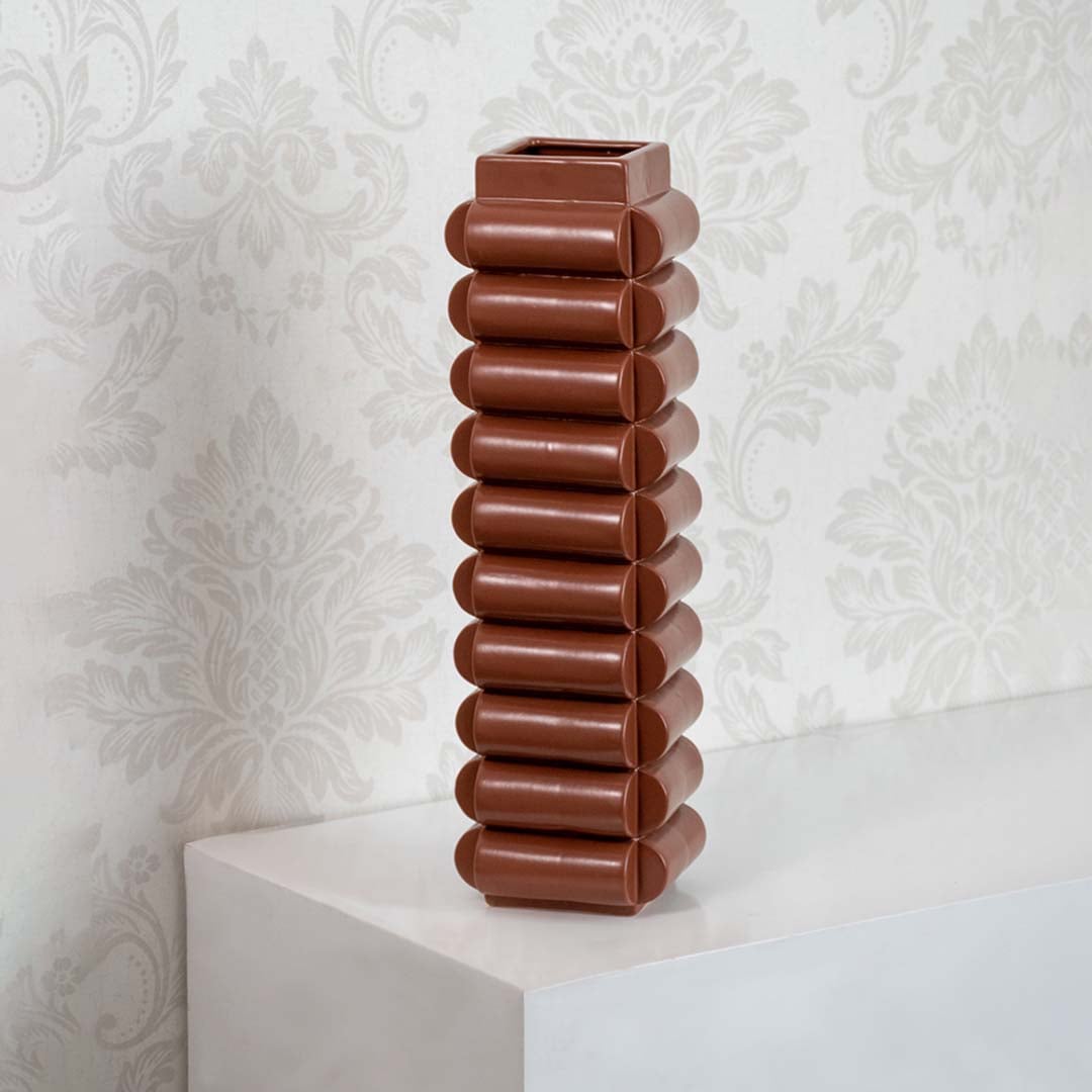 Brown ceramic designer vase with unique stacked pattern for stylish home table and shelf decoration.