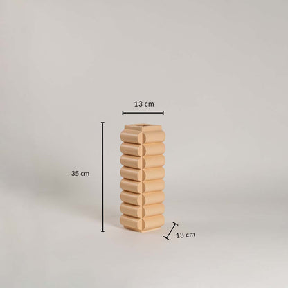 A beige geometric vase with measurements showing 35 cm height and 13 cm width clearly presenting its size and proportions for reference.
