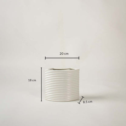 White ceramic planter with 18 cm height and 20 cm width shown clearly for accurate size reference and decor planning needs.
