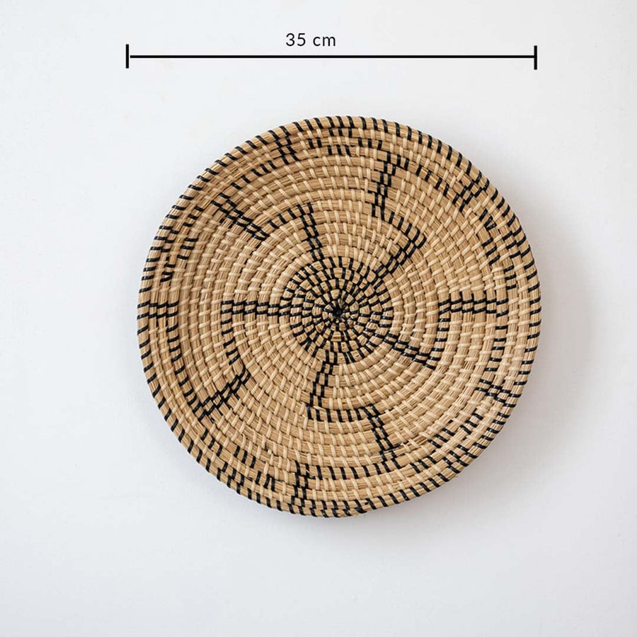 Dimension image of round woven wall decor showing exact diameter measurement for easy placement in living room or hallway.