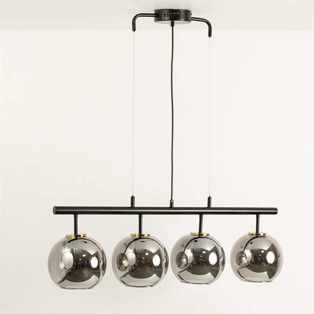 Chrome glass globes chandelier displayed on white background with light off showing polished reflective finish and artistic modern design.