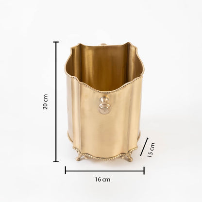 Brass container with 20 cm height 16 cm width and 14 cm depth shown with engraved design and scalloped edges.