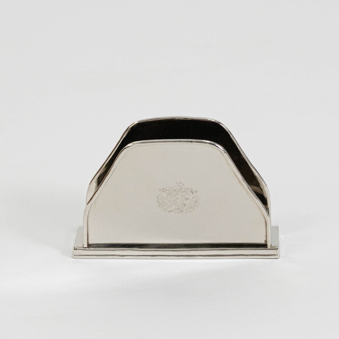Main product image of silver tissue holder with royal crown engraving clean lines and rectangular base on white surface.