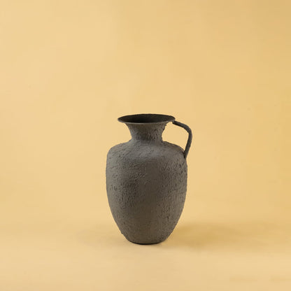 Grey metal jug vase decor on a clean white background highlighting its textured matte finish for versatile home styling.